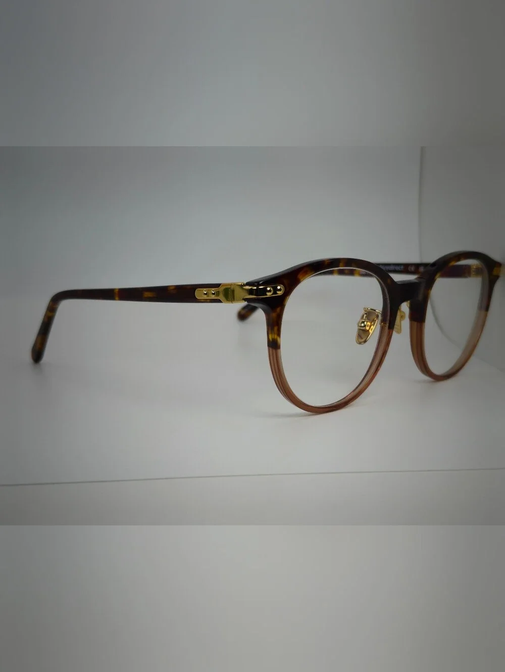 Dotti. Smoke Under Tortoiseshell Upper.  Eyeglasses - Brown Amber. Gold